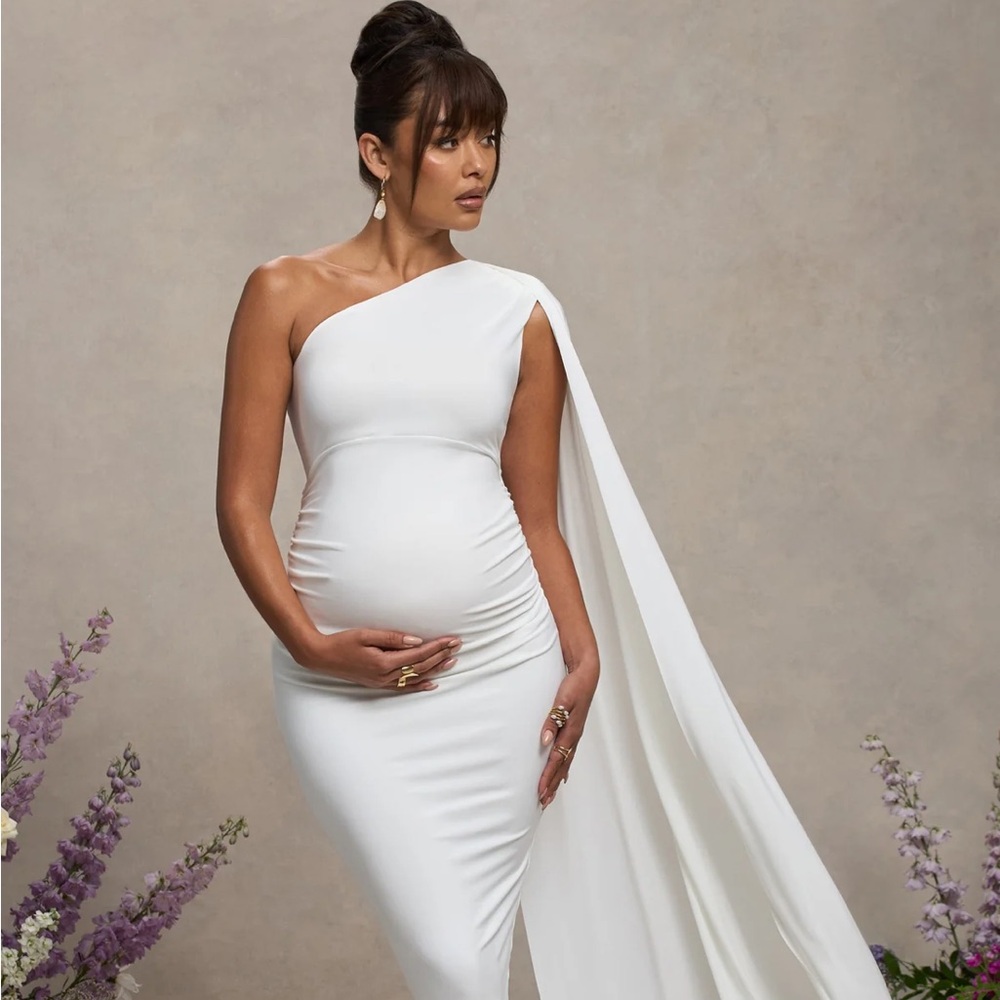 CLUB LONDON AMARYLLIS
WHITE MATERNITY ONE SHOULDER MAXI DRESS WITH CAPE SLEEVE